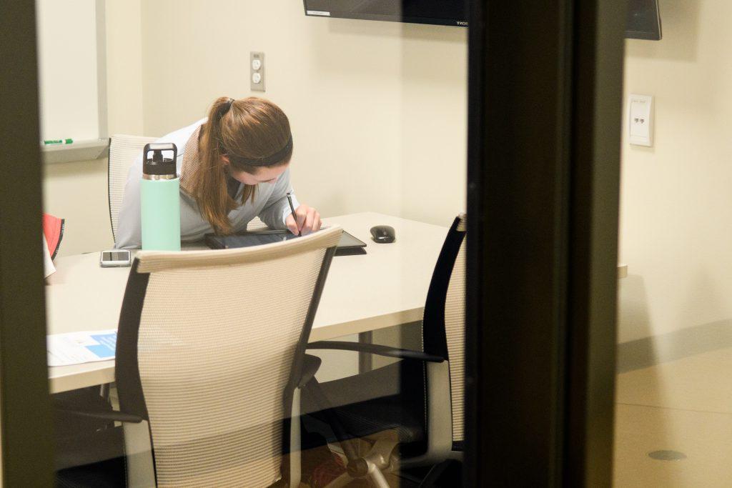 Student studying in the Plaster Center